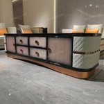 Luxury Coffee Table with Quilted Upholstered Panels Natural Wood Veneer Finish and Stainless Steel Accents